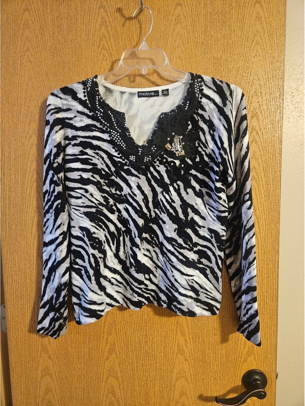 Motive sweater